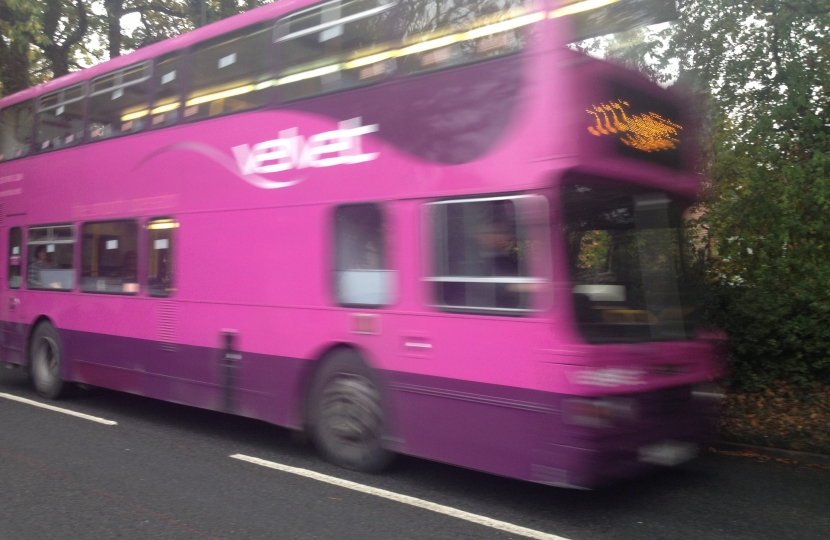 Purple bus moving