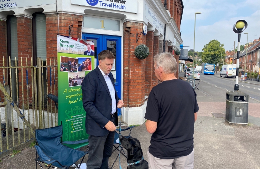 Steve Brine talking to a resident at his Summer tour street surgery