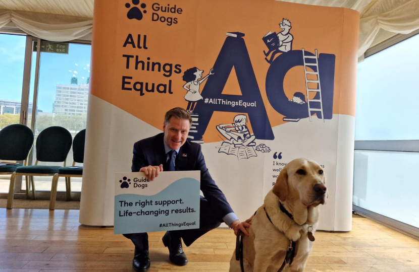 Pictured; Steve Brine MP with guide dog, Webb.