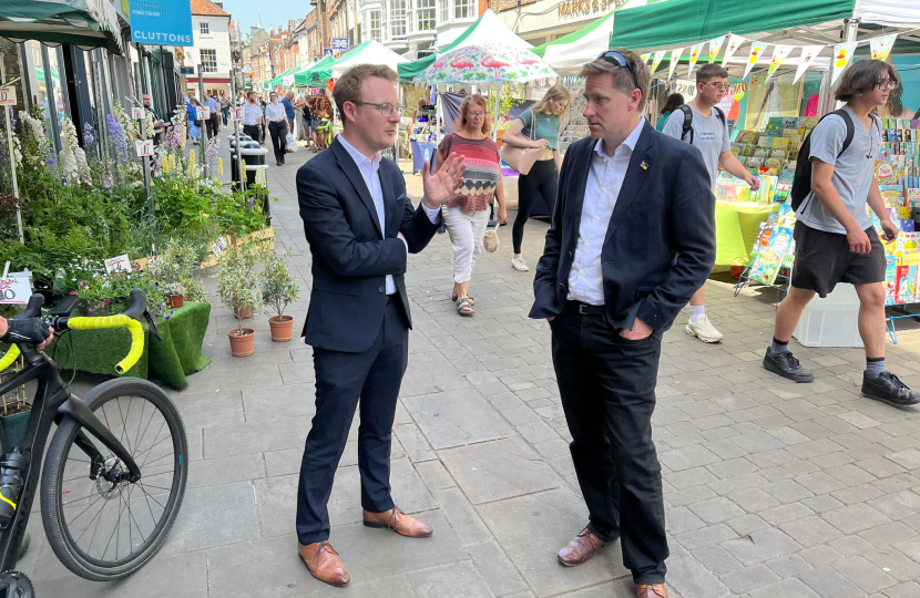 Pictured; Steve Brine MP and Paul Spencer talking on Winchester High Street.