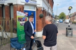 Steve Brine talking to a resident at his Summer tour street surgery