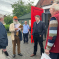 Pictured; Steve Brine MP, Bernard Tucker, Robin Atkins and others in front of the New Alresford Museum.