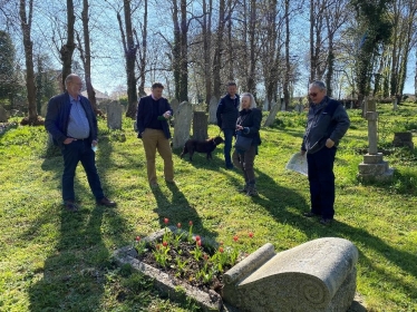 Pictured; Trustee Dominic Hiscock, Steve Brine MP, Fundraiser Mike Thorpe, Anna Stewart and David Stewart in the graveyard.