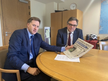 Pictured; Steve Brine MP showing Minister Jeremy Quin MP how the campaign featured on the front-page of a recent edition of the Hampshire Chronicle.